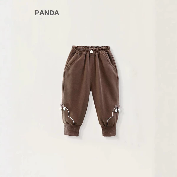 Brown trousers with two flowers on the hem