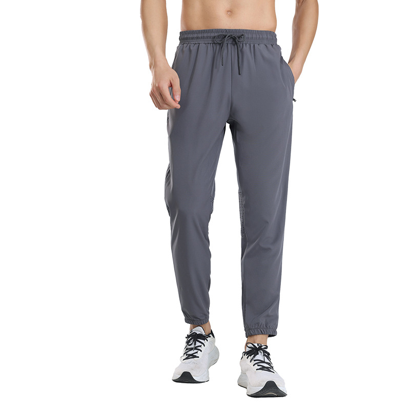 Pantalones deportivos de secado rápido para hombres pantalones casuales de primavera y otoño fitness deportes pista y campo de entrenamiento elástico alto pantalones atados al tobillo
