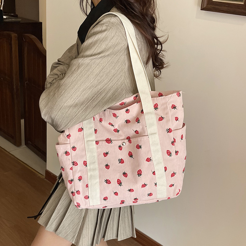 Coreano ins chica impresión de fresas viaje mochila 2025 nueva gran capacidad velcro bolsa de mano casual