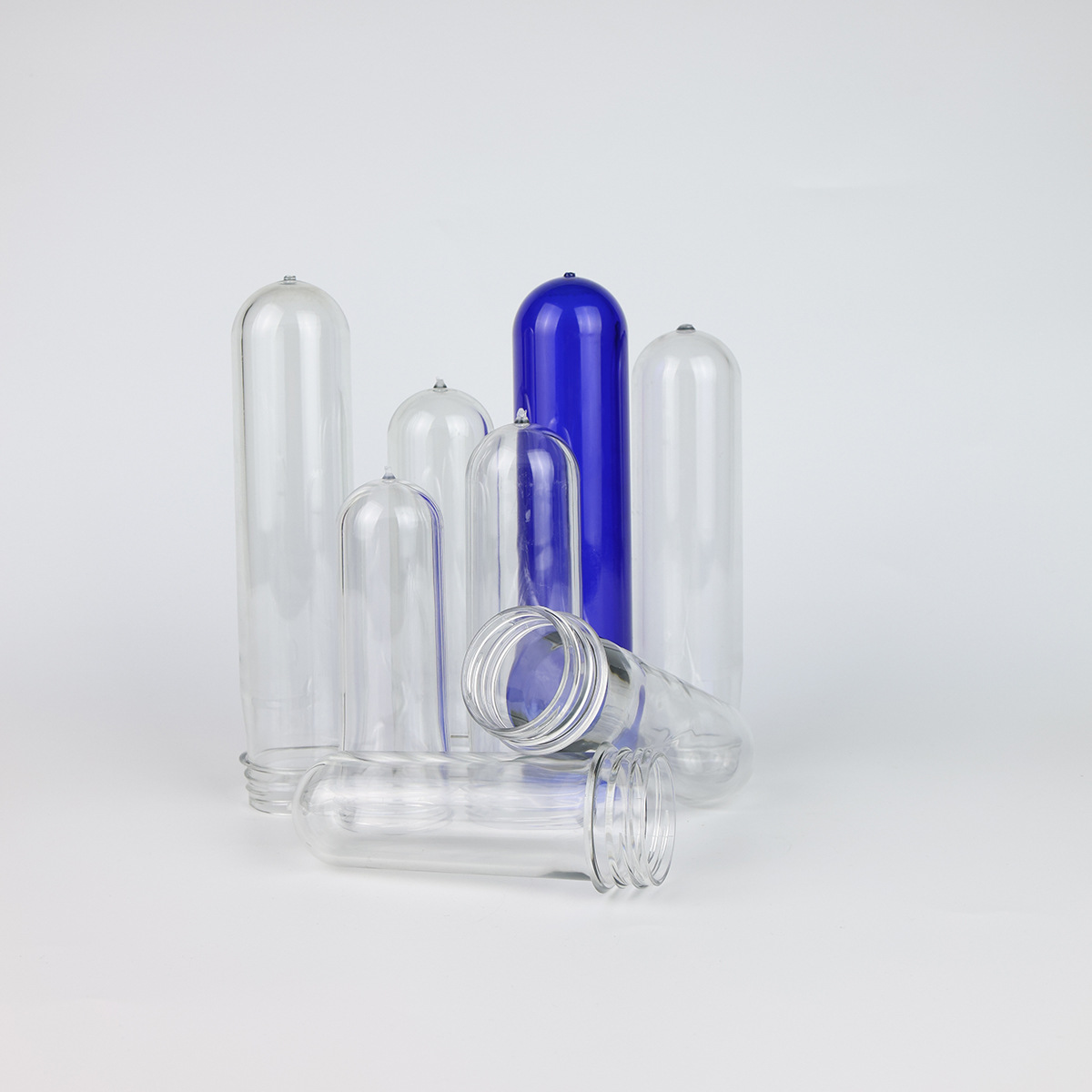 Fábrica directa de alta transparencia de grado alimenticio de plástico verde botella en blanco 48 calibre PET botella en blanco de gramo opcional