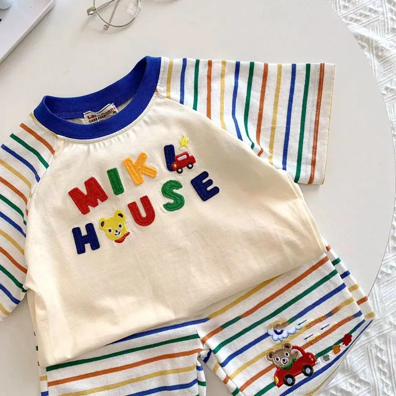 2023 nueva ropa para niños de verano niños y niñas costura a rayas de color pantalones cortos de manga corta traje de bebé para niños traje de dos piezas