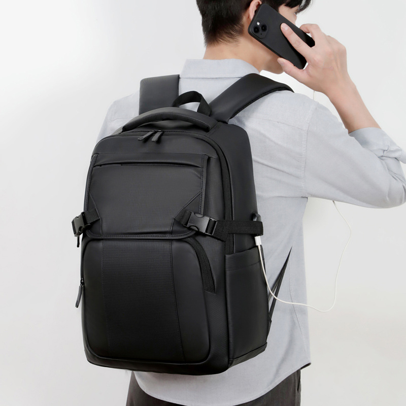 Mochila de negocios transfronterizos de gran capacidad de interfaz USB bolso de computadora portátil colgante tirón mochila de viaje de negocios