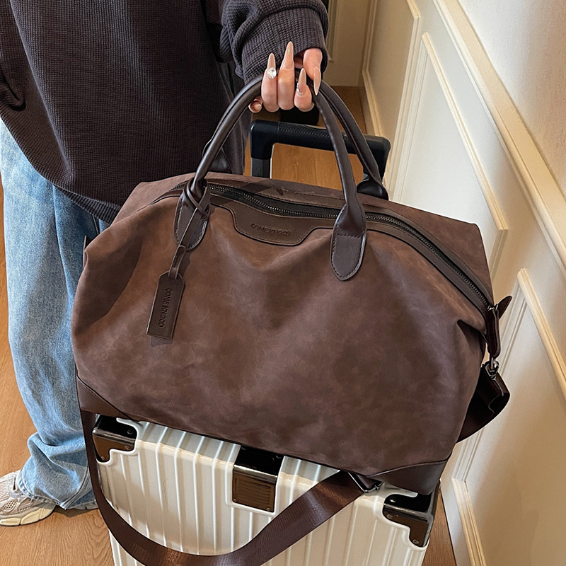 Bolsas de viaje para hombres y mujeres 2025 nuevo bolsas de equipaje de mano de gran capacidad bolsas deportivas de fitness bolsa de almacenamiento al por mayor bolsa al aire libre