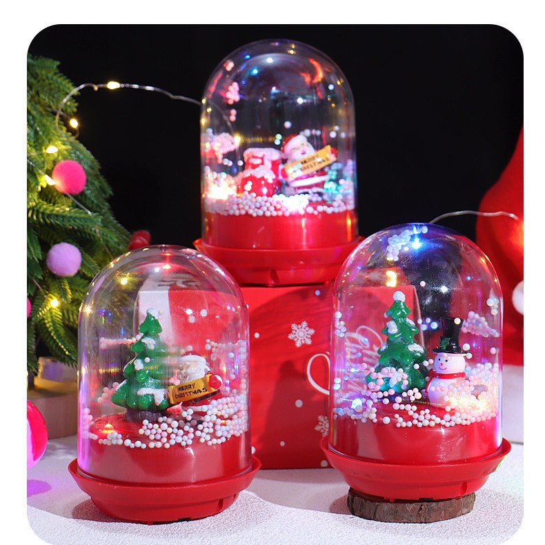 Decoraciones Qixia pareja regalos luminosos sombreros giratorios pareja decoraciones de escritorio música Navidad transfronteriza explosión