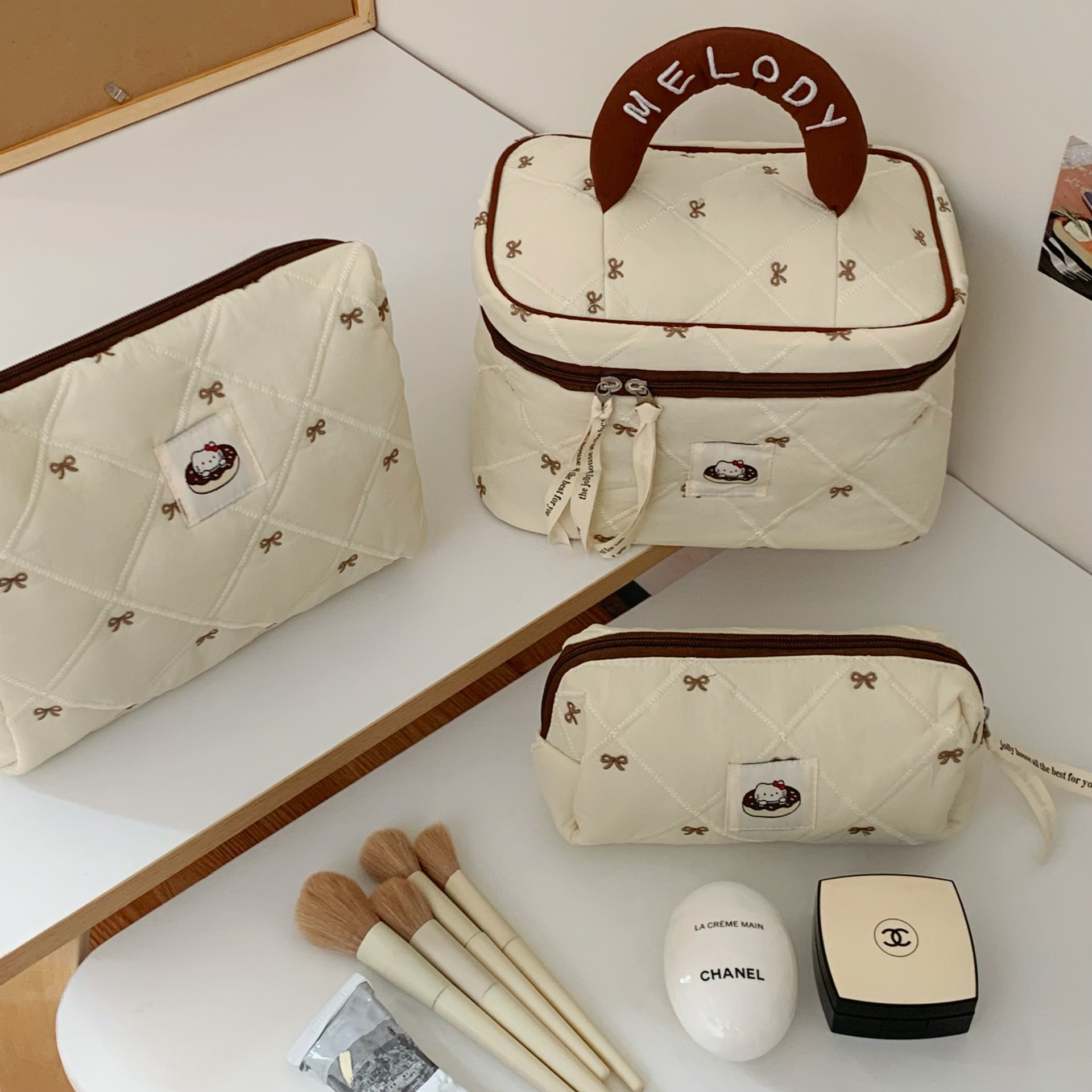 Versión coreana de la bolsa de cosméticos con lazo simple, bolsa de lavado de viaje portátil de gran capacidad, bolsa de almacenamiento de cosméticos para niñas