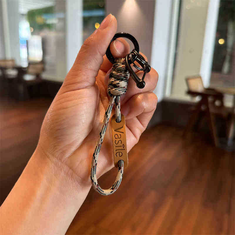 編まれたパラコードキーホルダーおしゃぶりストラップチェーンバッグペンダント高級レザーペンダント紛失防止ポータブルカーキーホルダー|undefined