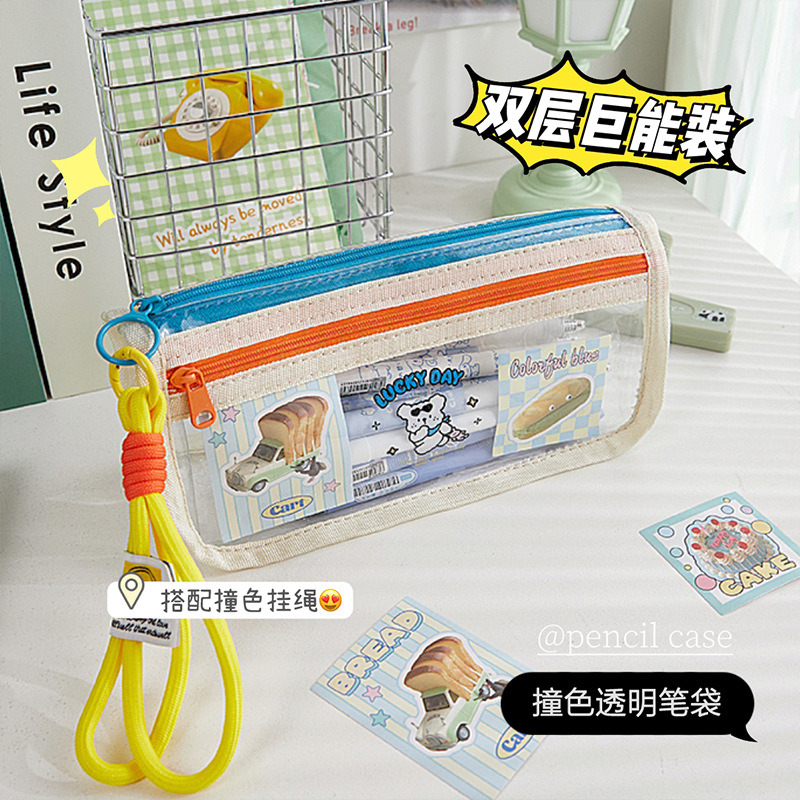 Nueva caja de lápices de gran capacidad de color de contraste transparente para niñas, sentido de diseño, caja de papelería de nicho, caja de lápices estilo ins para estudiantes de escuela primaria