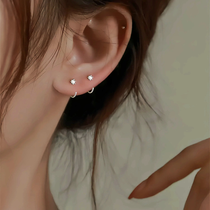 S925 plata esterlina chapado en oro 14K clásico seis garras ganchos de orejas de un solo diamante nicho para mujeres actualización simple de moda auriculares versátiles
