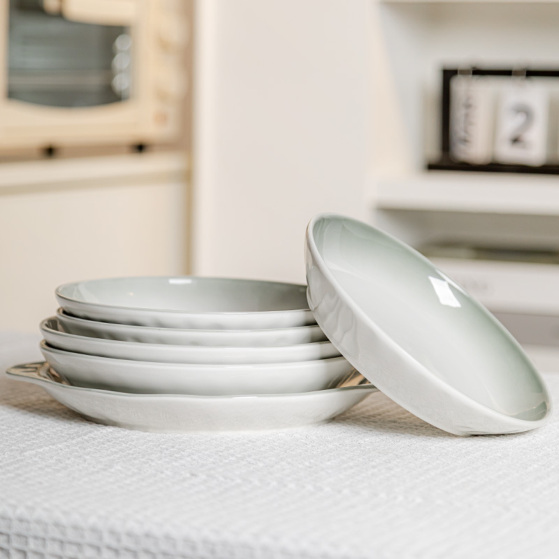 Platos de color esmaltados platos domésticos 2025 nuevos platos de alto valor de cara platos de platos de cerámica platos de arroz