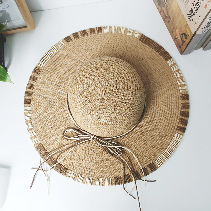 Gran sombrero sombrero de paja primavera y verano vacaciones de mar sombrero de sol damas moda para cubrir la cara arco sombrero solar al por mayor