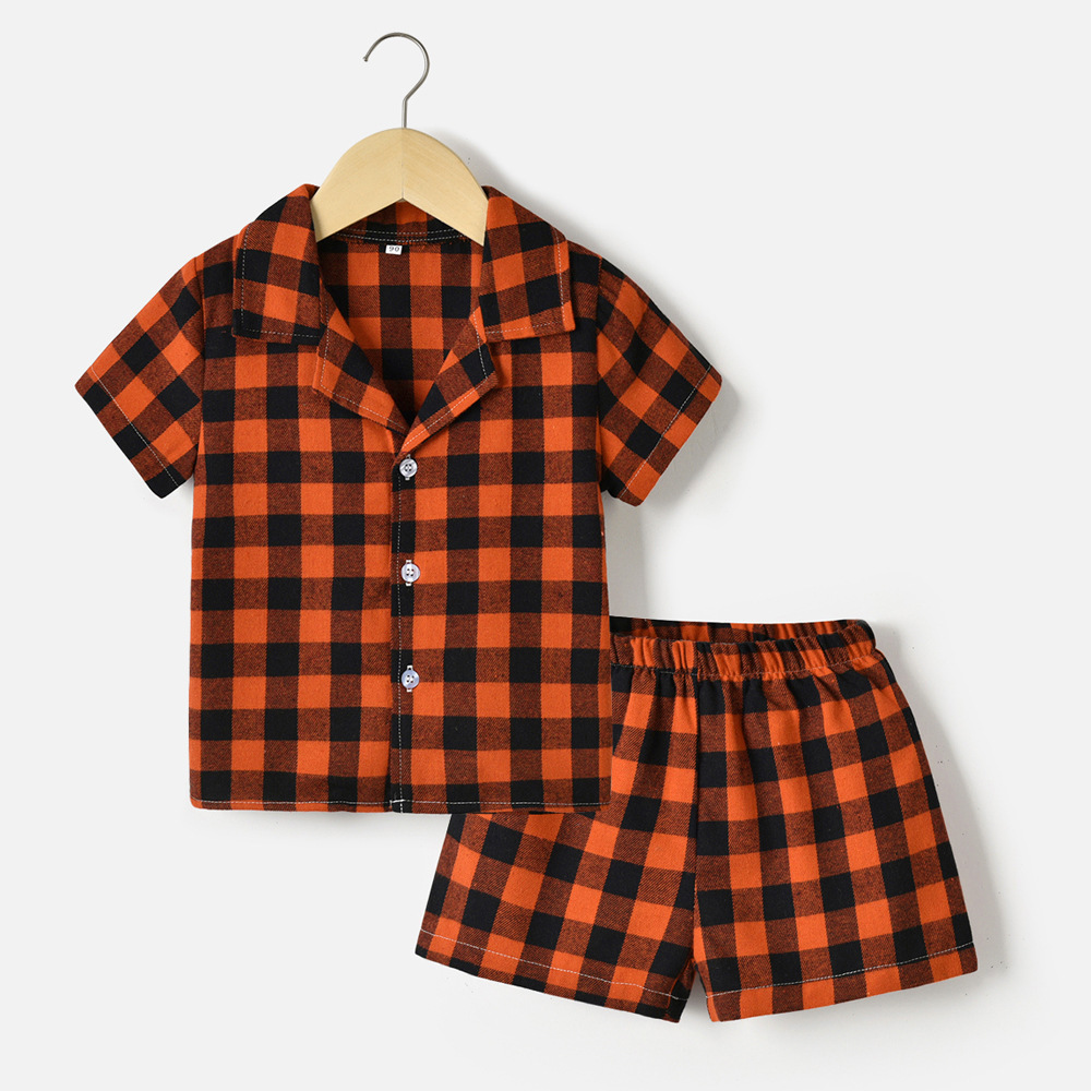 2024 comercio exterior ropa para niños y niñas rebeca de manga corta a cuadros con solapa de verano pantalones cortos elástico pijamas kids de dos piezas