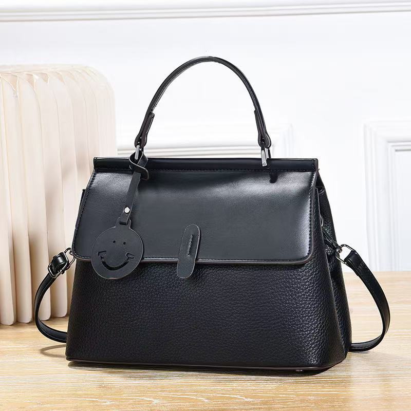 Bolso de hombro simple bolso de color sólido bolso de mano adorable bolso de mochila bolso al por mayor transfronterizo bolsos de mujer pu