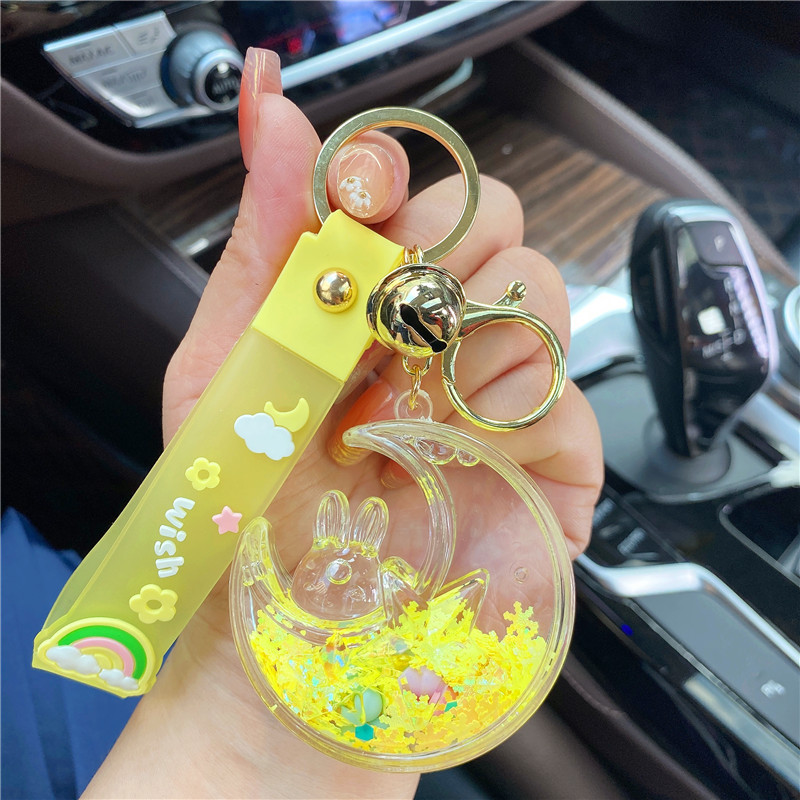 Red de aceite creativo rojo luminoso copo de nieve estrella Luna conejo Quicksand botella llavero femenino lindo Quicksand botella colgante bolsa adornos