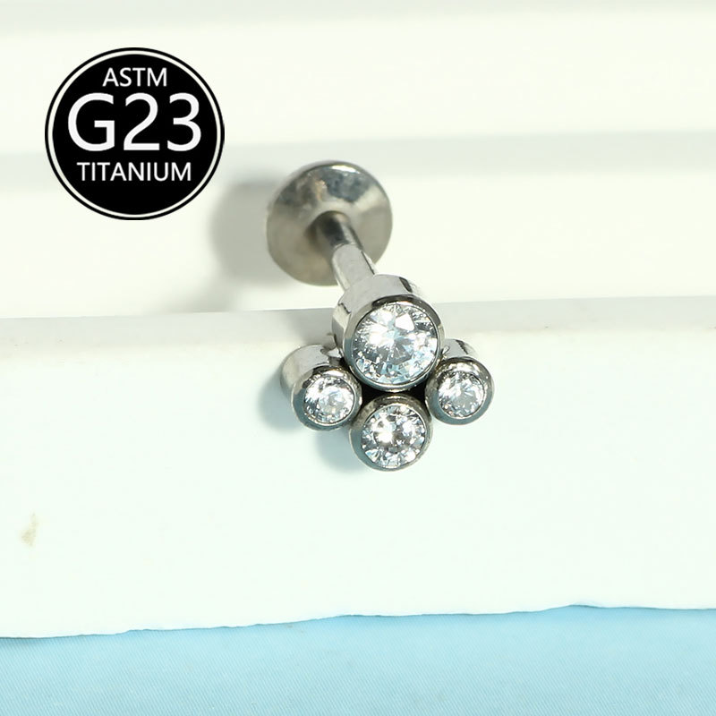 Silver pointed spike labret stud material detail