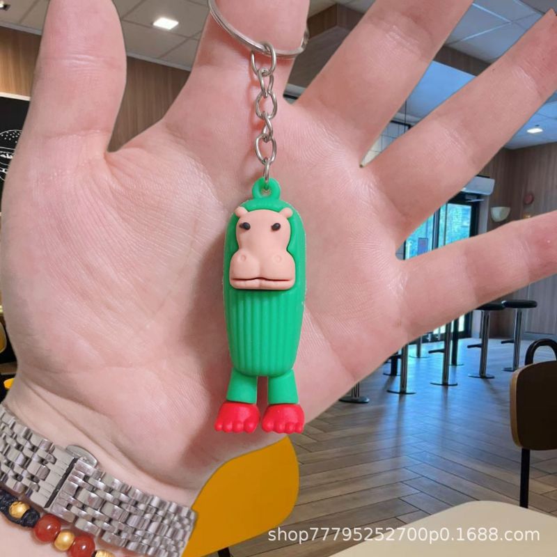 人気のDouyinホットエッセンス外国の山と海の経典キーホルダーペンダント抽象的な面白い木の棒人間の大きな足の木PVCペンダント|undefined