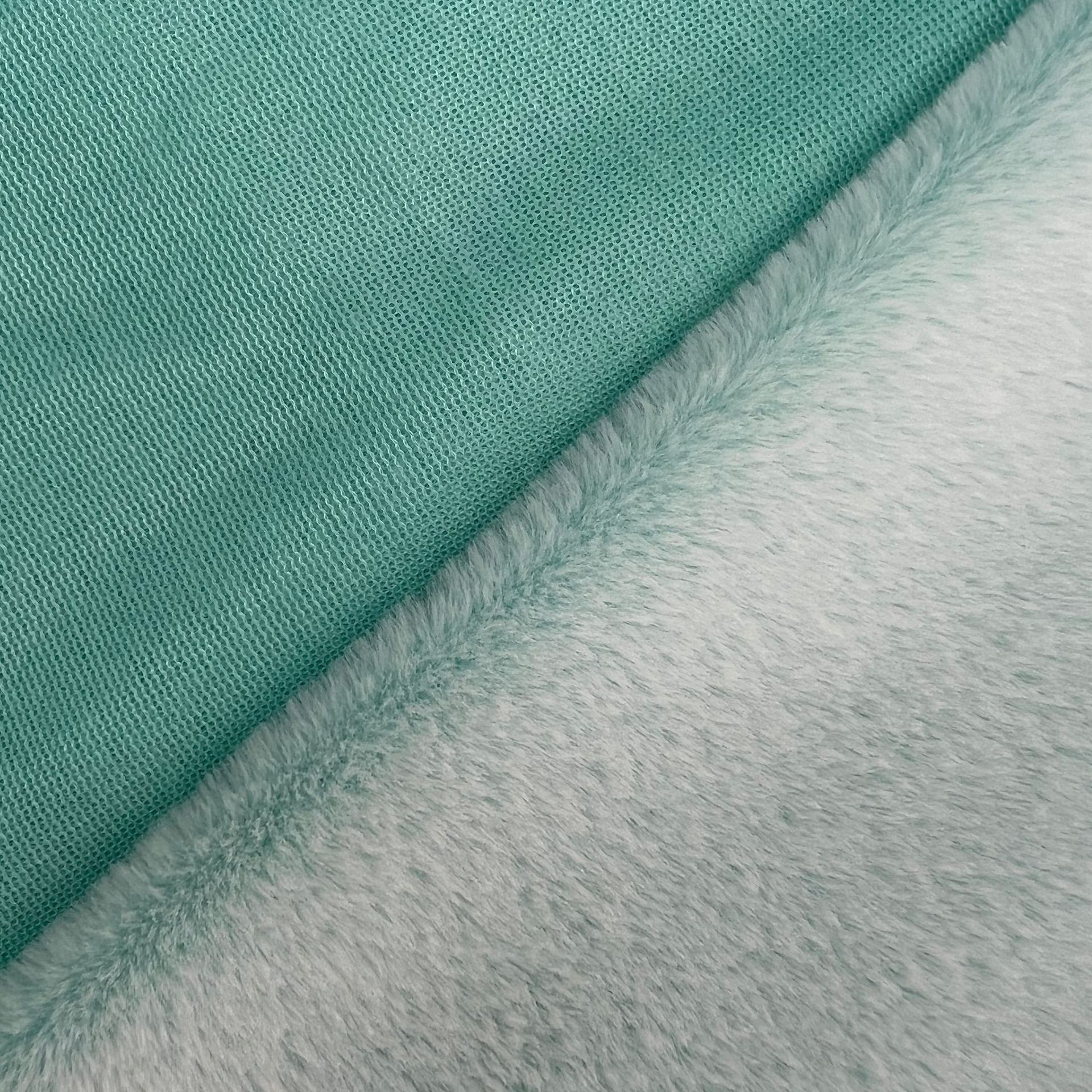 Tela de piel de conejo de dos colores con fondo de impresión trasera en stock
