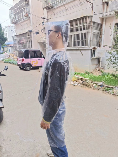 Adults-new material 65 grams of button transparent raincoat