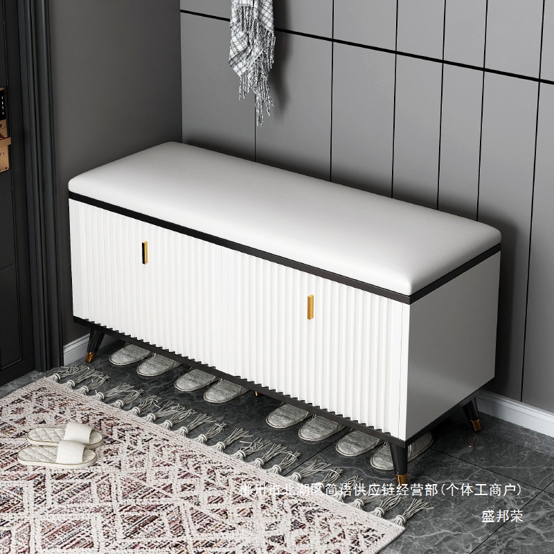 Fábrica directa de cambio de zapatos taburete zapatos gabinete integrado puerta de entrada se puede sentar bolsa de lujo suave asiento taburete puerta de almacenamiento doméstico