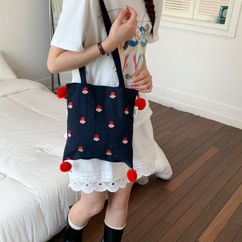 2026新款刺绣单肩包女款可爱卡通手提托特包大容量休闲学生上课包
