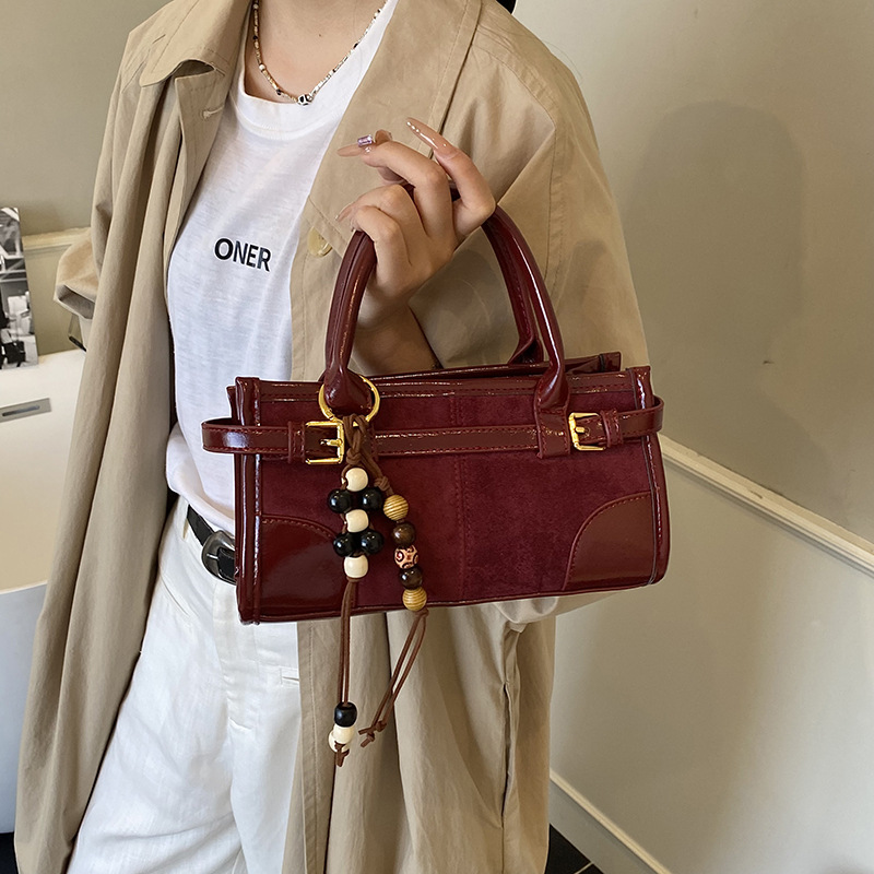 Transfronterizos otoño invierno retro esmeriado empalme bolso de mano mujer 2025 nueva moda color contraste bolso de hombro