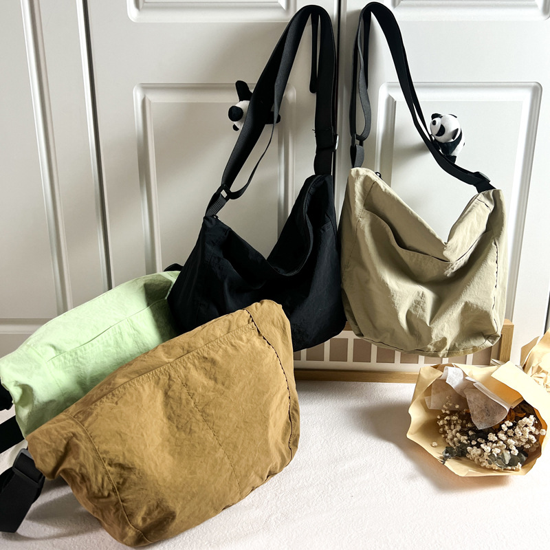Bolsa de hombro coreana para niños y niñas simple de color sólido de gran capacidad bolso de mochila para niños nuevo tipo de bolso de comercio exterior transfronterizo para niños