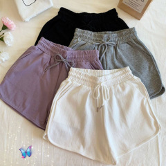 韓国のスポーツパンツ女性の夏の新型のゆったりした大きいサイズの学生の純色のランニングヨガの広い足の熱いズボンのファッションの卸売り