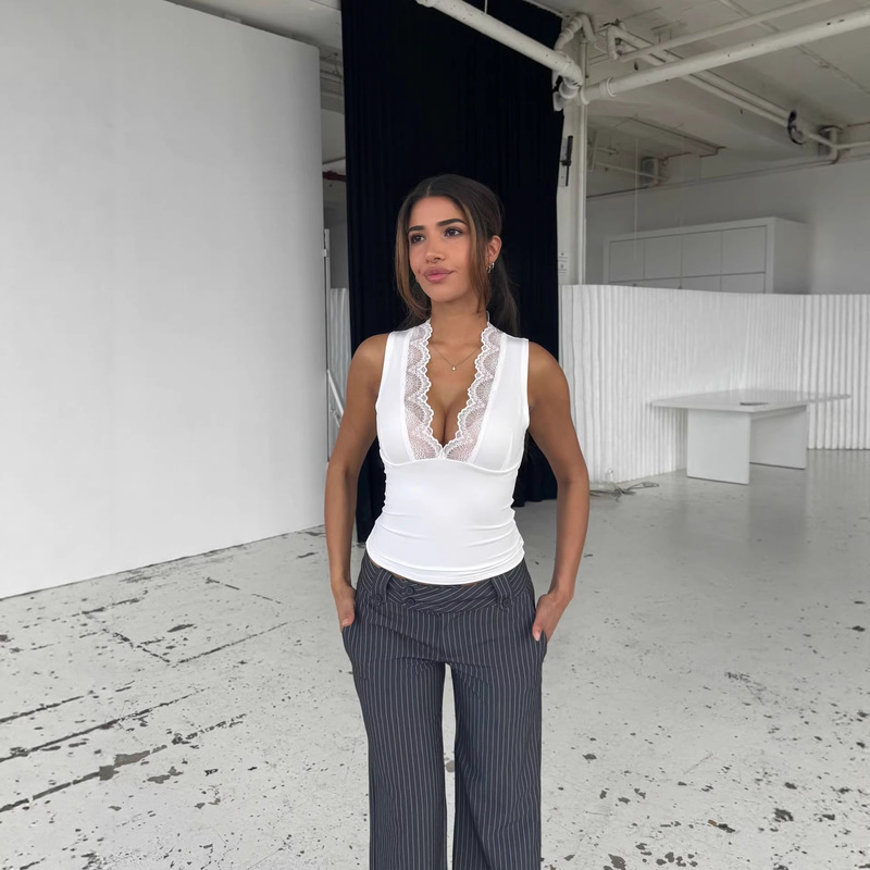 2026 Spring New Product, Sweet and Spicy Style, Solid Color Lace Splicing, Slim Fit, Low Neckline, Exposed Chest, Short Sleeveless Top Vest 2026 Spring New Product, Sweet and Spicy Style, Solid Color Lace Splicing, Slim Fit, Low Neckline, Exposed Chest, Short Sleeveless Top Vest