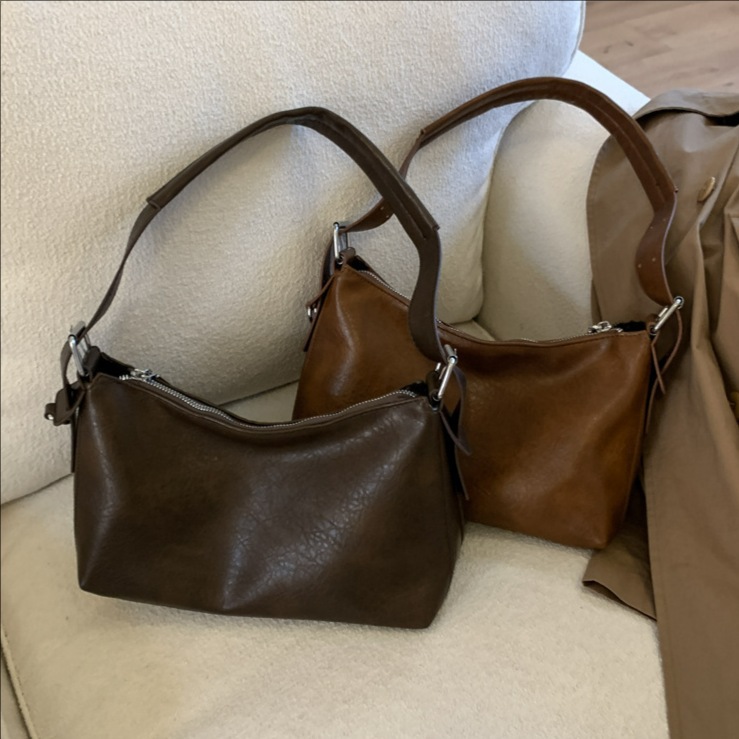 Bolso de viaje ocio coreano para mujeres retro hombro único bolso de bolsas de bolsas 2025 nuevo estilo de alta calidad sensación de cuero suave mochila