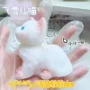 Flocking little white cat