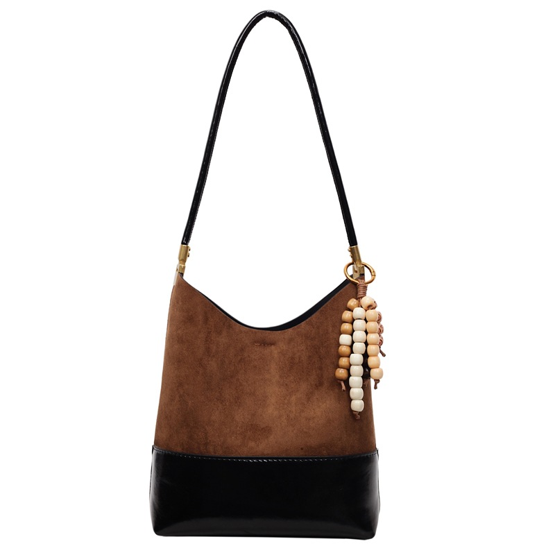 Bolsa de cubo de lujo ligera transfronteriza de gran capacidad para mujeres 2025, otoño y invierno, nueva bolsa de brazo universal, nicho, bolso de hombro de empalme