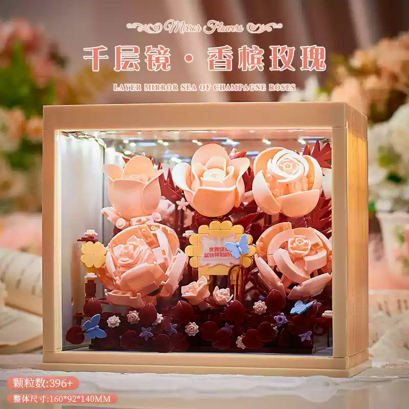 積み木の花がバラのオルゴールを飾っています。|undefined