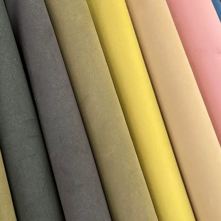 新款工厂直发贴面绒面羊巴超纤皮革0.6mm鞋材箱包家居里料首饰包