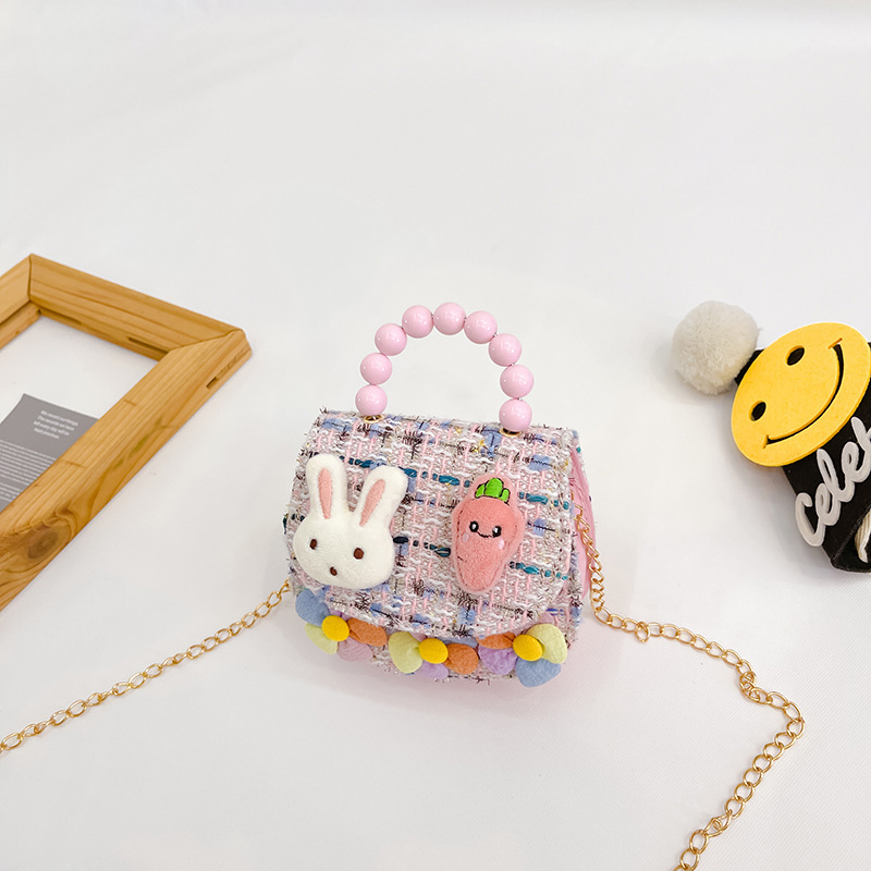 2022 nuevos niños bolso de hombro crossbody Chanel estilo niñas bolsa perla portátil accesorios de dibujos animados bolsa de desgaste