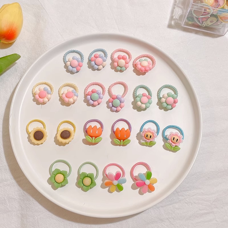 Los niños de la banda del pelo del bebé de la historieta no lastiman la banda de goma del pelo de la niña volumen del pelo menos cuerda del pelo del bebé