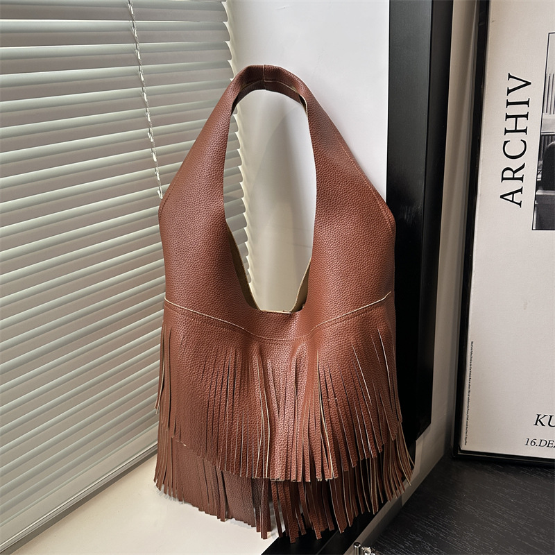 Bolsa coreana de bordas 2025, nueva moda de gran capacidad retro bolso de viaje relajado bolso axilar