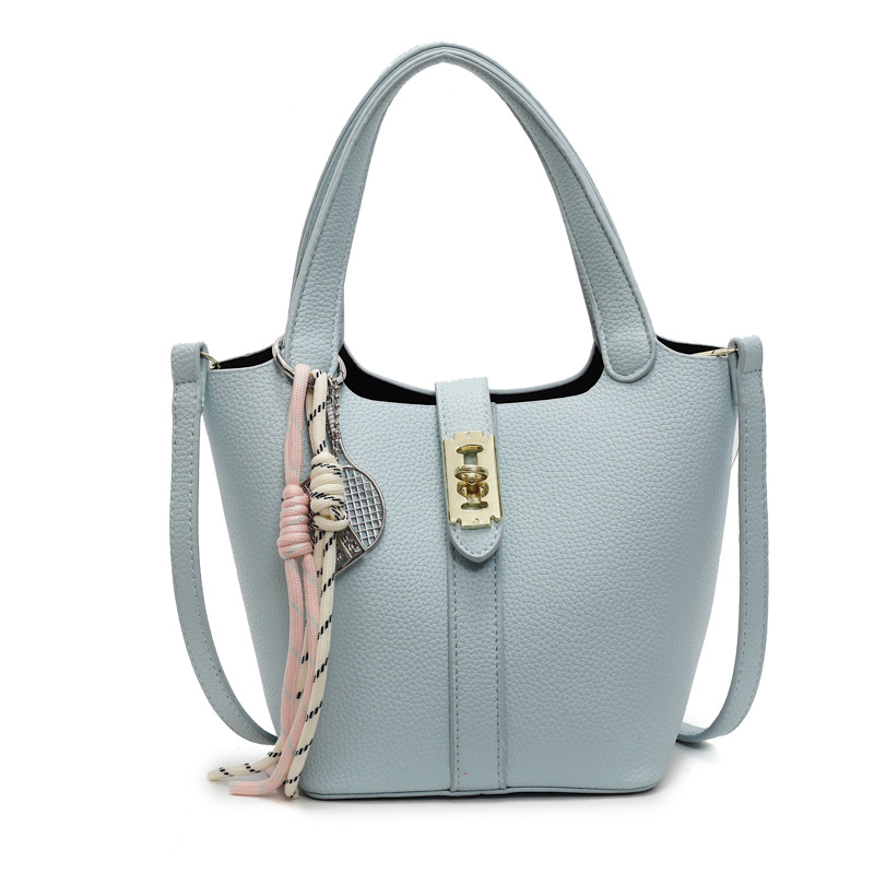 Este año, la popularidad de la bolsa de cubo para mujeres de alta calidad, el nuevo tipo 2025 de moda universal, bolso de transporte, bolso de moda extranjero