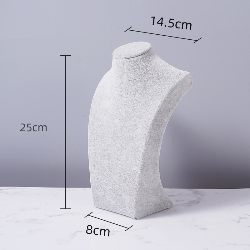 フランネルのネックレスの展示棚の人はモデルのアクセサリー棚のネックレスの首の型のカウンターの陳列道具のネックレスの棚のようです。|undefined
