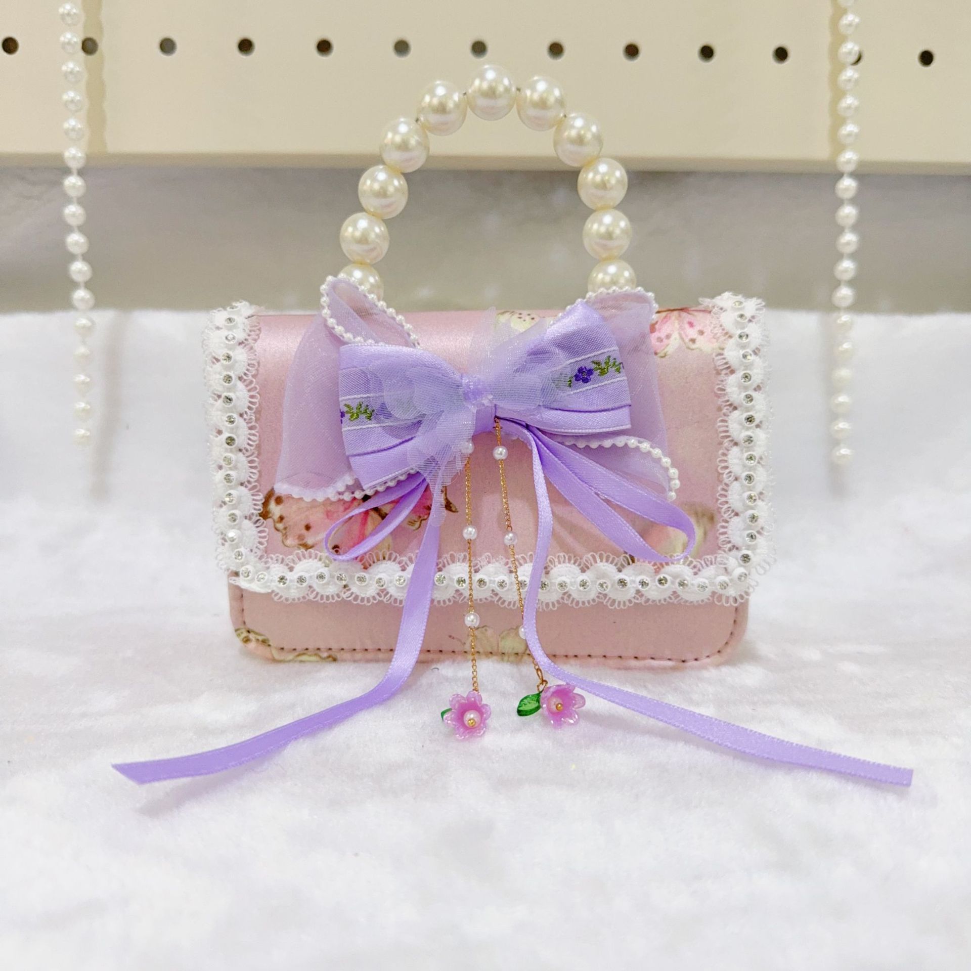 Otoño nuevo bolso infantil princesa perla bolso de mano pequeña fragancia chica bolso de moda bebé portátil