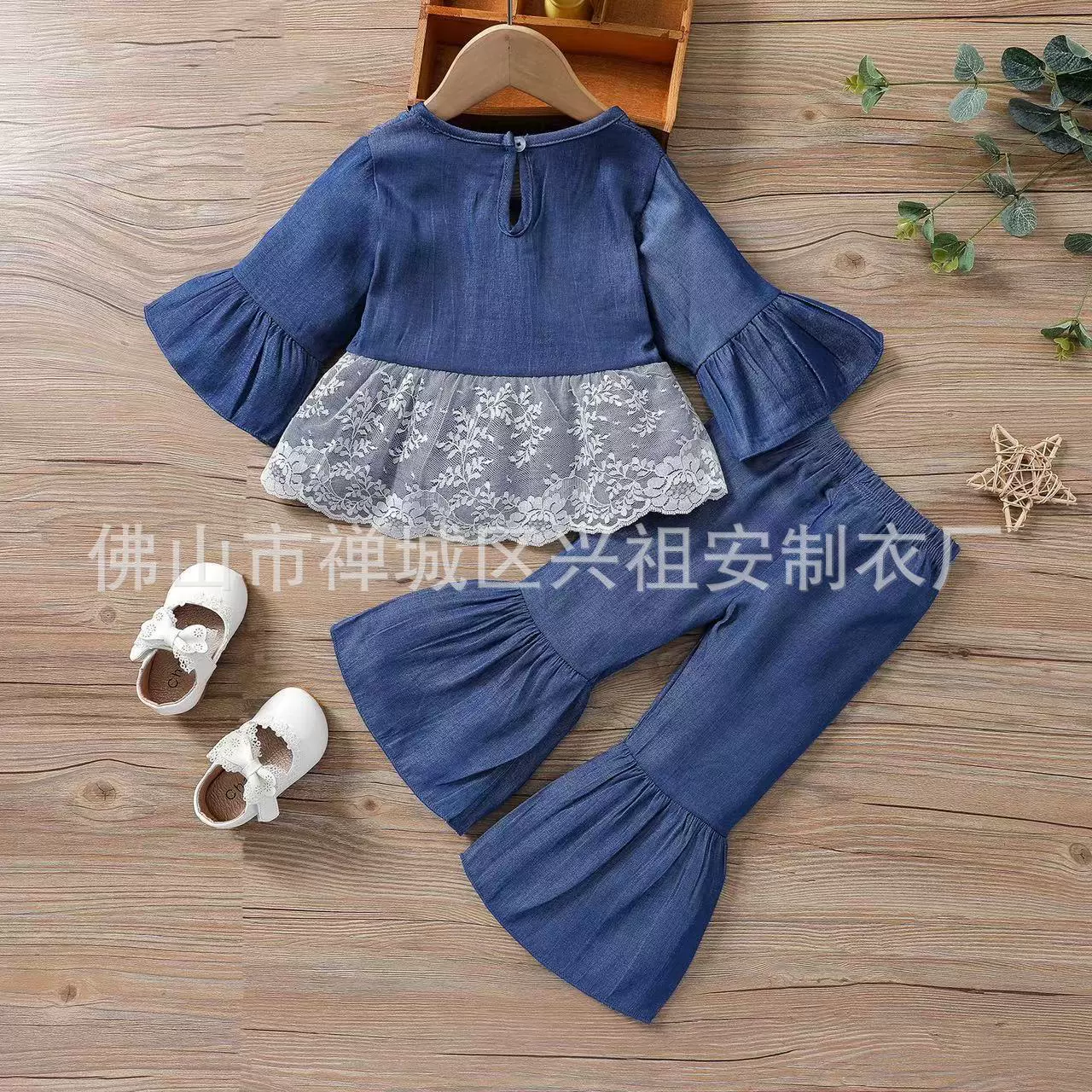 Doll with bow, lace blue flared trousers