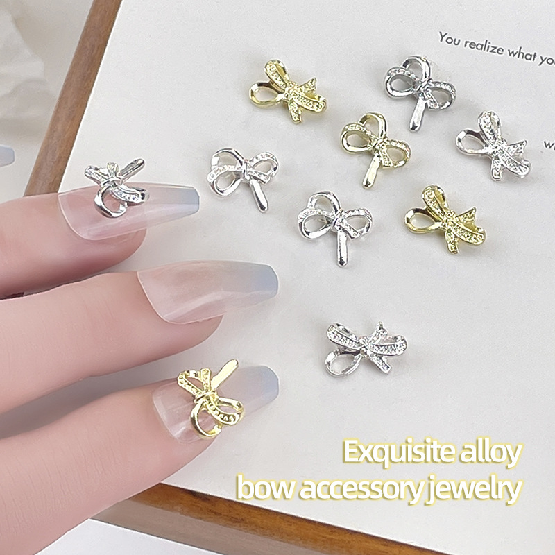 Nueva joyería de uñas, lazo, pajarita de lujo ligero, accesorios de uñas de aleación, accesorios de diamantes de uñas de celebridades de Internet tridimensionales, estilo caliente