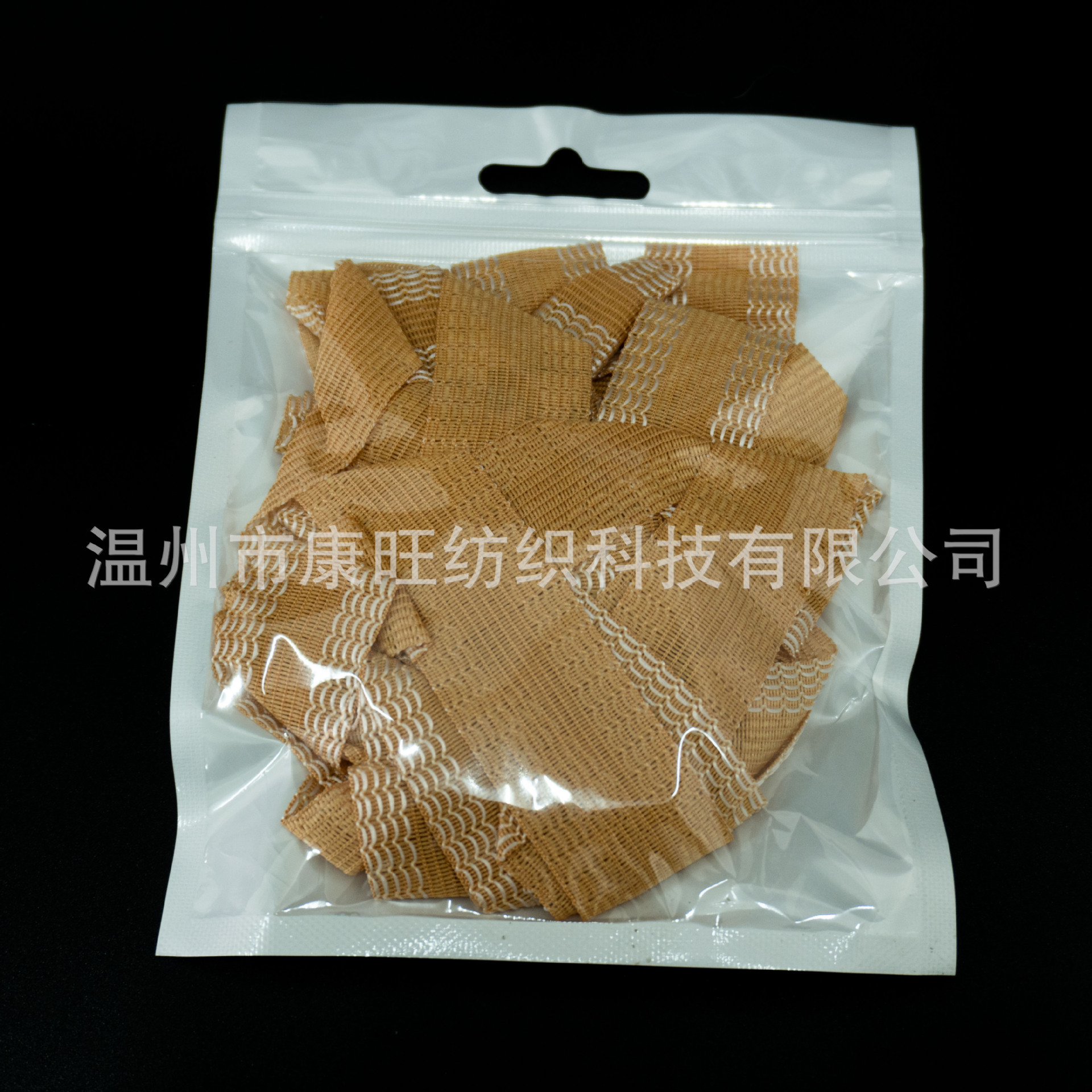 Los pantalones de la fábrica de Wenzhou se pegan en la boca del pantalón se acortan