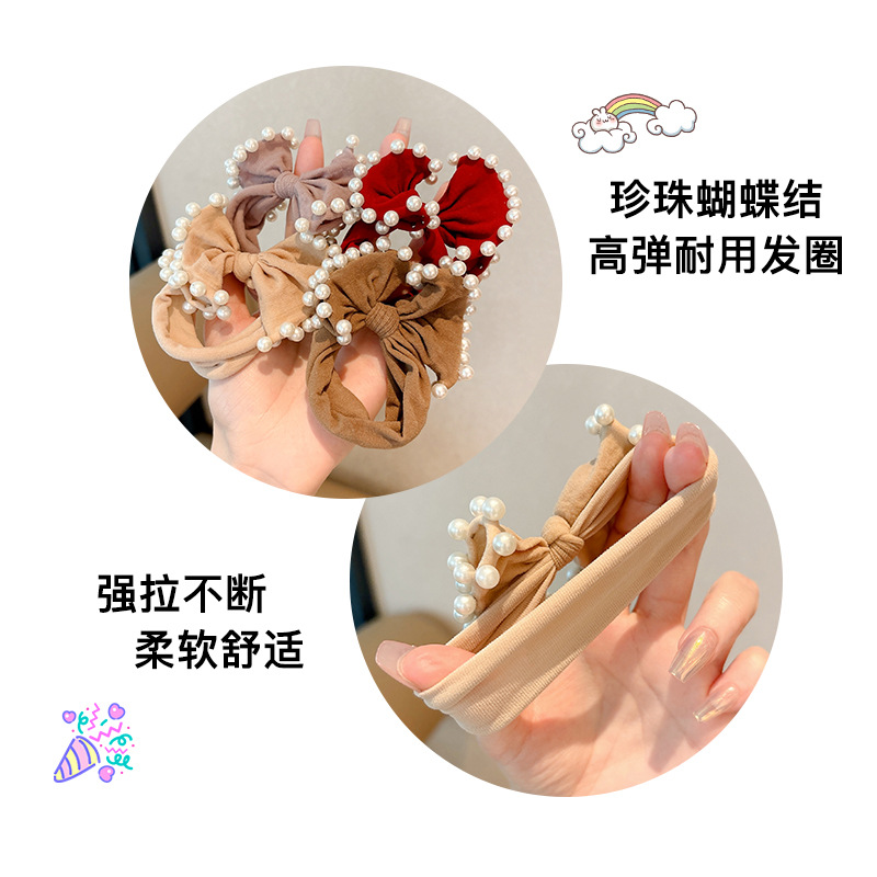 Arco de perla máscara anillo de cabello femenina baja cuerda de cabello bola adornamiento de cabello correa de cuero cuerda de cabello al por mayor
