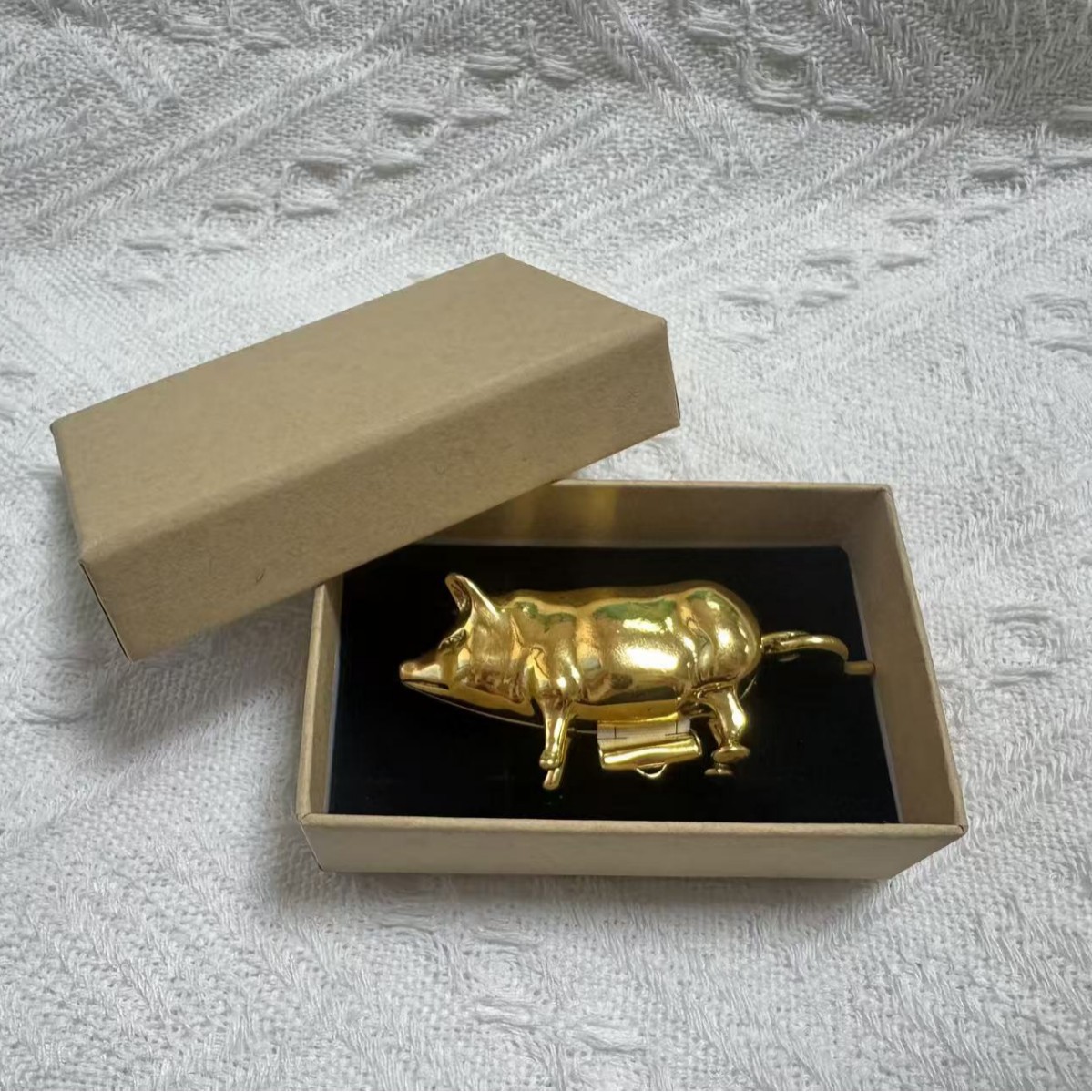 Retro golden tape measure pig