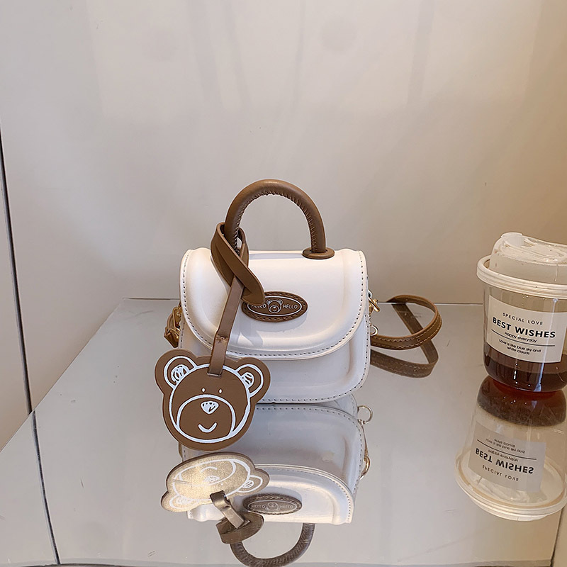 2023 otoño nuevo estilo coreano nicho niños mini mano de la muchacha llevar crossbody accesorios lápiz labial pequeña bolsa al por mayor