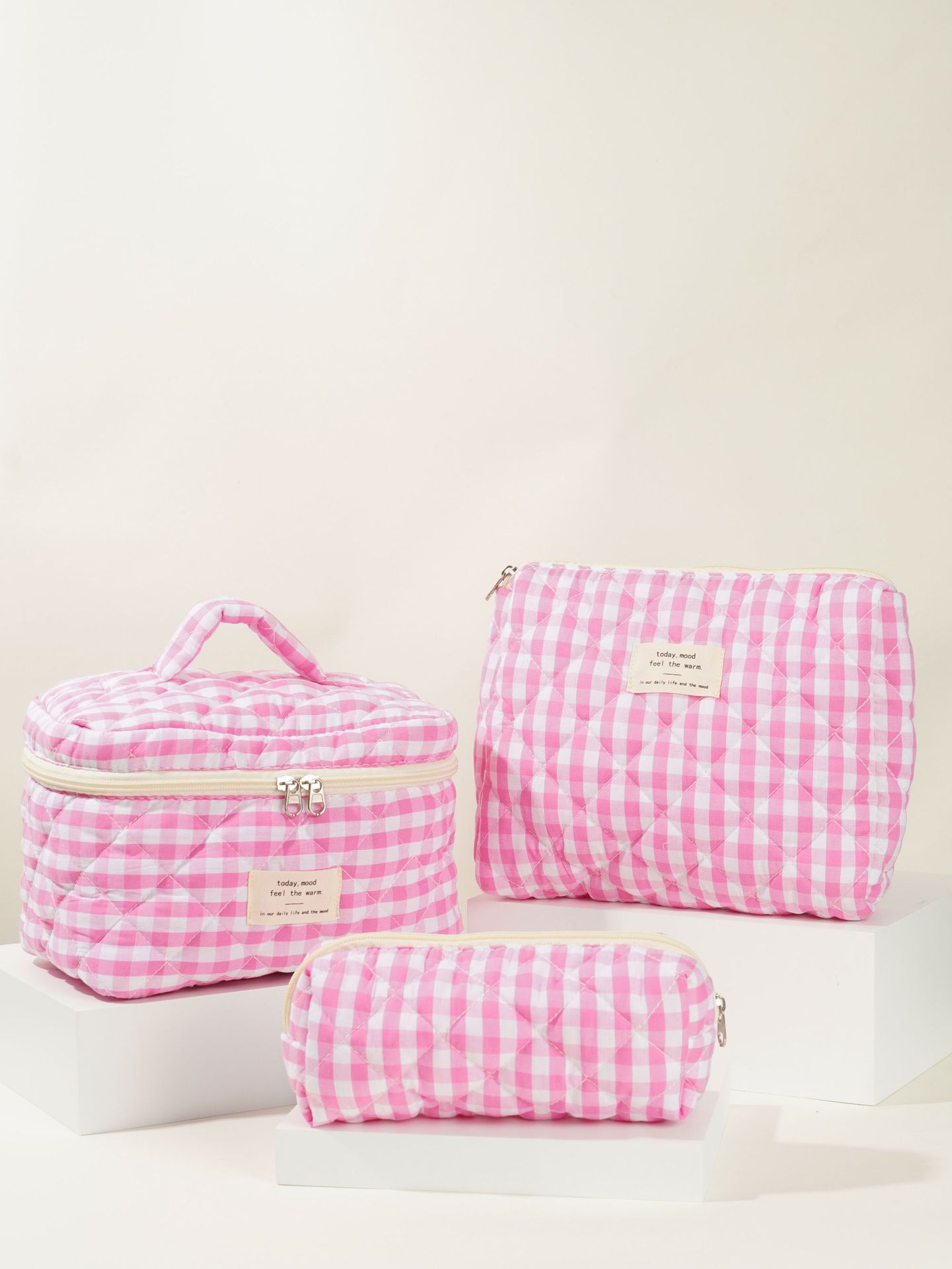 Handheld capacious cosmetic bag