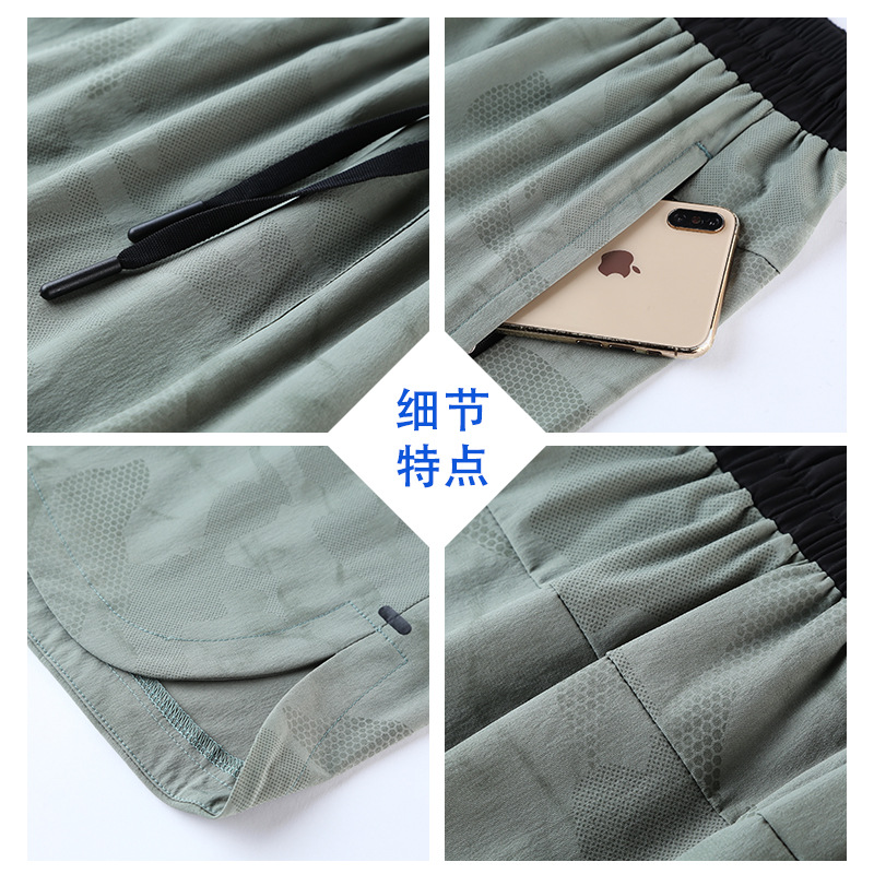 Pantalones cortos deportivos de fitness al aire libre de los hombres de verano moda Pájaro casa casual suelta transpirable pantalones cortos de secado rápido