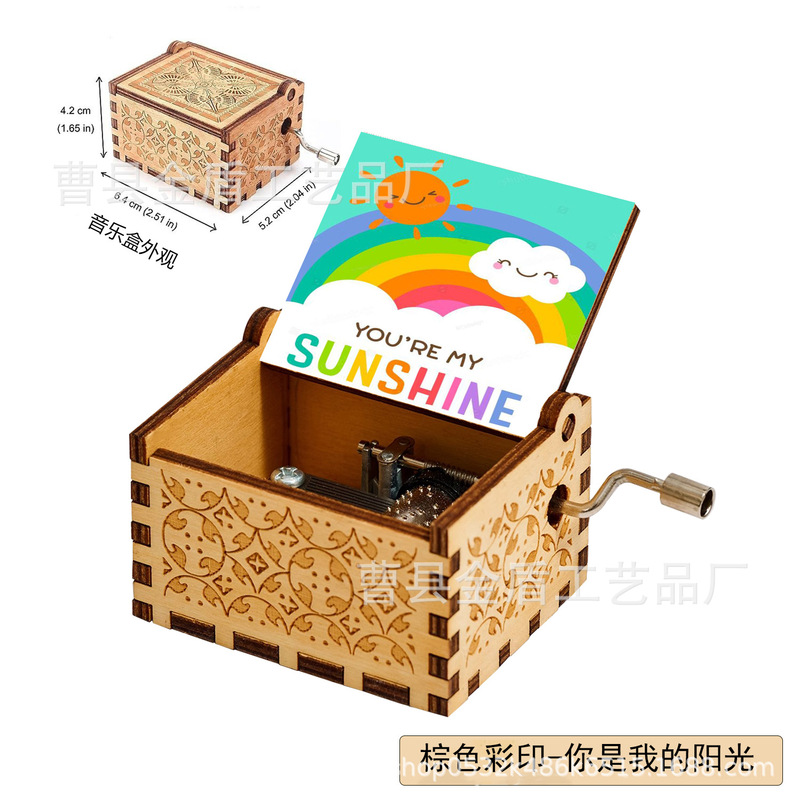 木製の手で音楽箱のアイデアを揺らします。|undefined