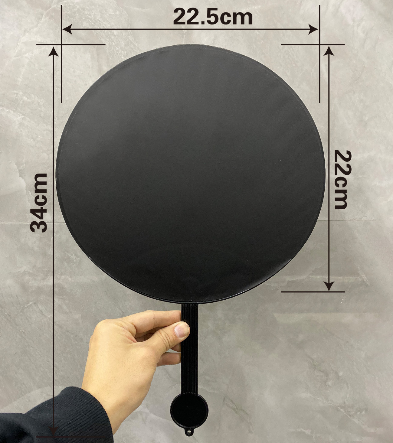 Small round fan with black face