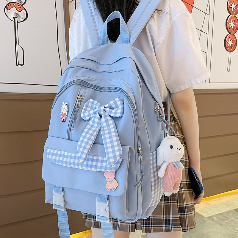 Mochila escolar para niñas de primaria y secundaria, diseño con lazo y estilo dulce, ligera y espaciosa
