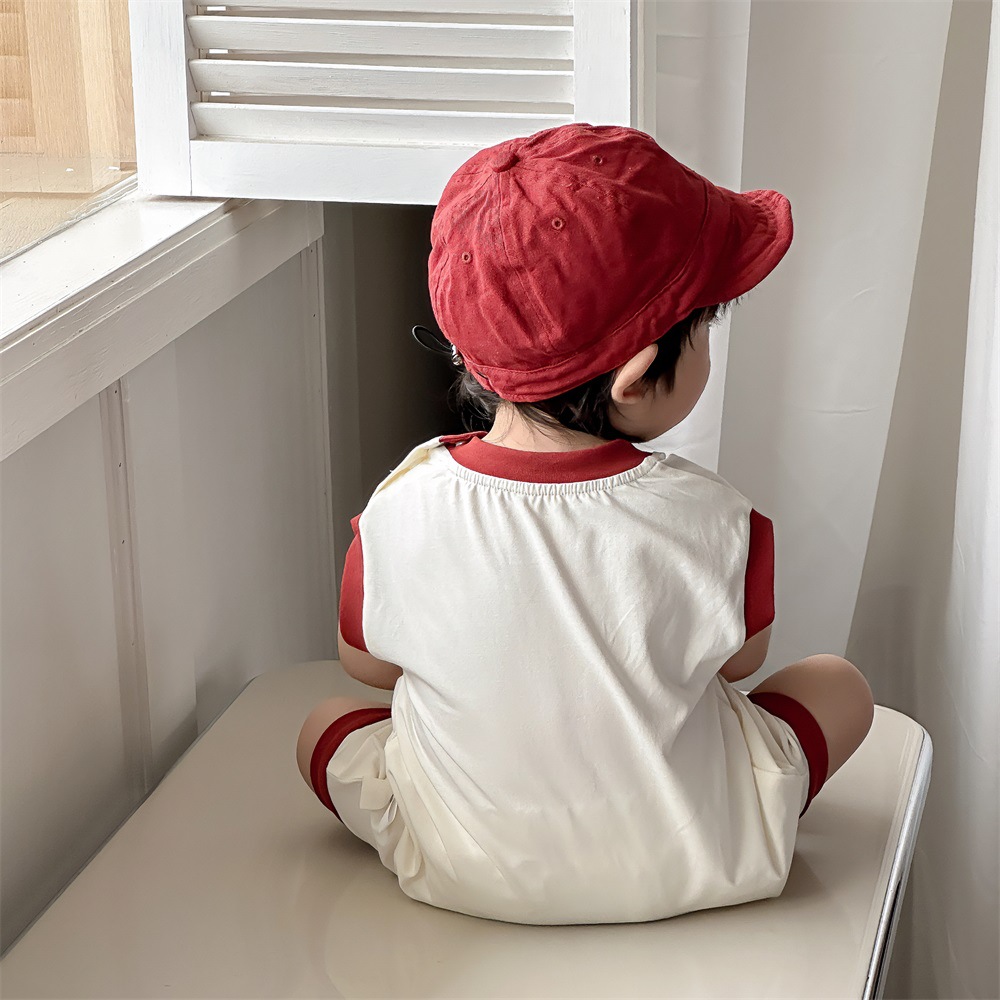 Estilo delgado de verano de estilo coreano, ropa de salida de clase, cara sonriente de dibujos animados, bebé de un año, cuello redondo sin mangas, mono casual